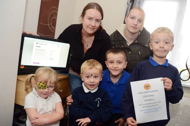 Lisa Pritchard, top left, wants as many people as possible to sign her petition.