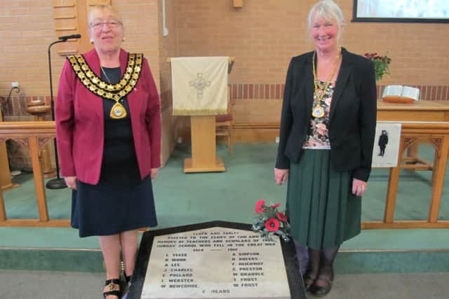 At the rededication of the memorial to 14 men who died in WW1 at Trinity Methodist Church. Pictured at the rededication are ADC Chairman Coun Elisabeth Mays and Dawn Raffle, standing in as consort.