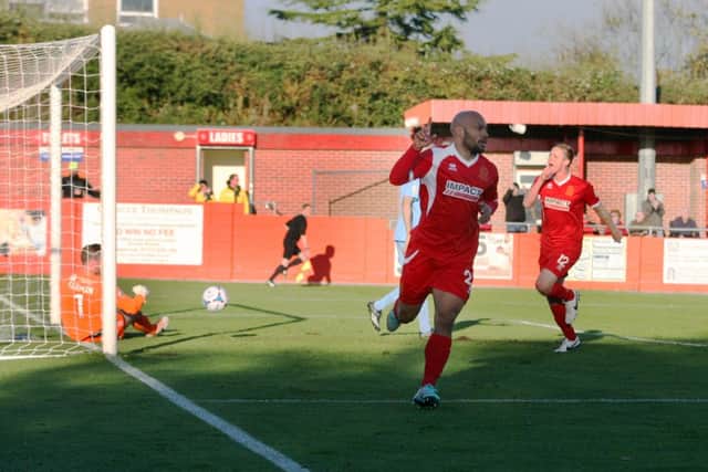 Karl Hawley wheels away after scoring Alfretons equliser.