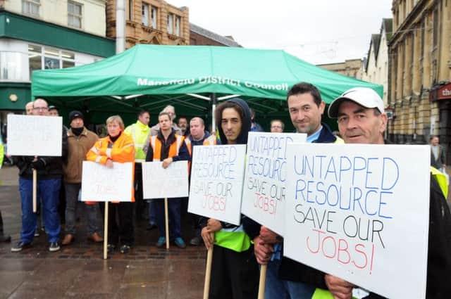 Untapped Resource protest in Mansfield Market Place on Friday following the lose of their funding.