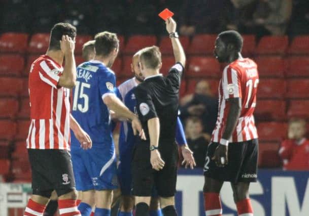 Referee Ross Joyce sends off Karl Hawley -Pic by: Richard Parkes
