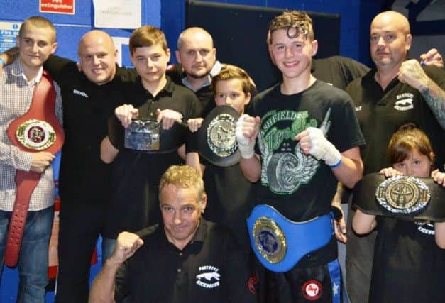 Kade Hardy (third from right) celebrates his Commonwealth title success after beating Luke Kennedy in Alfreton.