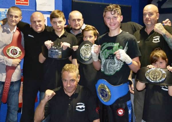 Kade Hardy (third from right) celebrates his Commonwealth title success after beating Luke Kennedy in Alfreton.