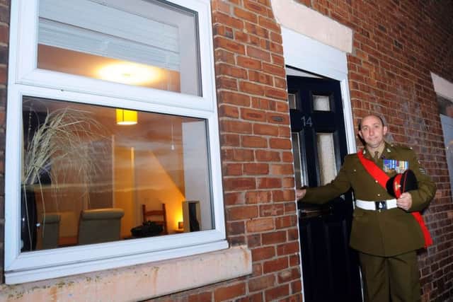 Sgt. Larry Phillips outside his Hillmoor Street home in Pleasley.