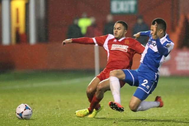 Alfreton's Nathan Hicks is foiled by Rovers defender Daniel Leadbitter -Pic by: Richard Parkes