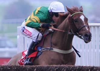 UXIZANDRE, ridden by Barry Geraghty and on his way to victory in the 2m Listed Shloer Chase, one of the horses to follow from Cheltenham's Open meeting (PHOTO BY: Nigel French/PA Wire)