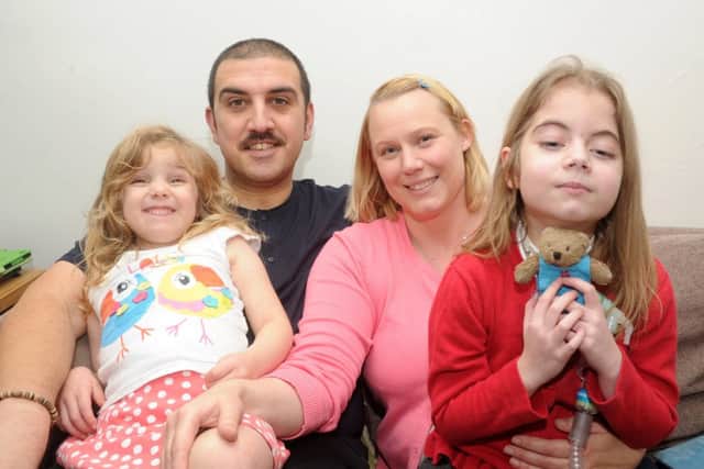 Freya Bingham (r) with her Nick, Clare and sister Anya, five. Picture: Andrew Roe