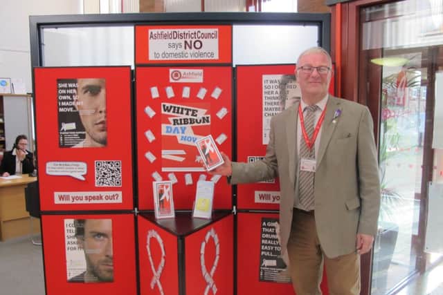 Ashfield council leader Chris Baron promotes the White Ribbon campaign against domestic abuse.