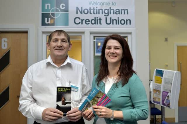 Nottingham Credit Union. volunteer Andy Stowe and manager Ella Ferris