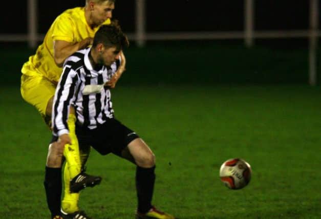 Retford United 4-3 Selston FC (AET)Notts Senior Cup - Round ThreeTuesday 2nd December 2014Adam Lee in action for Retford United.Jon Knight 07825 047766