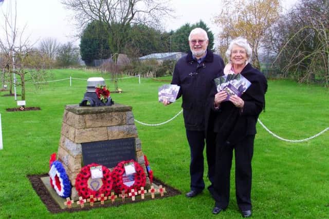 Howard Heeley from Newark Air Museum and Coun Maureen Dobson are pictured at the Winthorpe aviation memorial with copies of the booklet