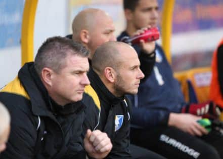Micky Moore and Adam Murray on the Stags bench.