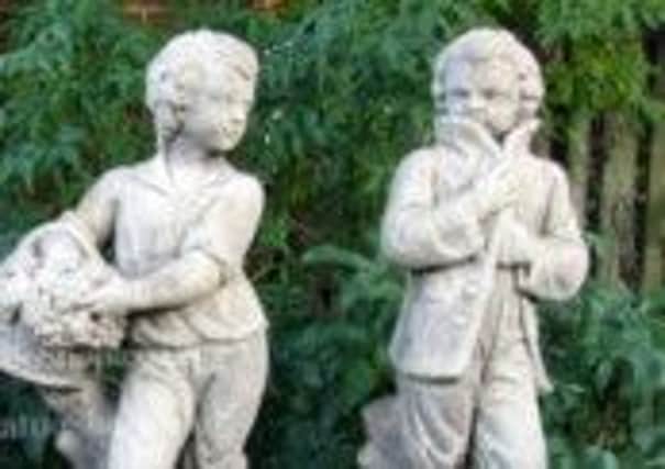 Statues similar to these were stolen from a garden in Tibshelf