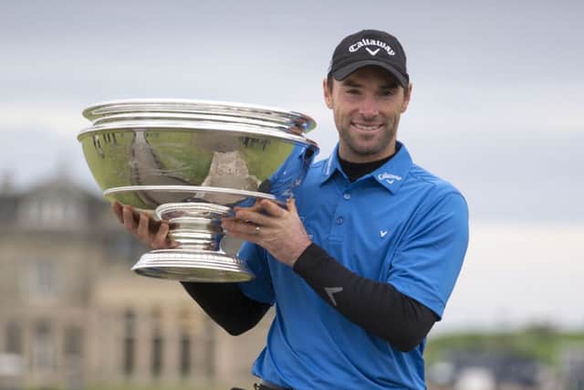 Oliver Wilson celebrates winning the Alfred Dunhill Links Championship at St Andrews Old Course. Picture by Kenny Smith/PA Wire.