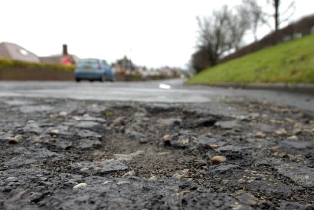 Pot holes and uneven roads in Notts