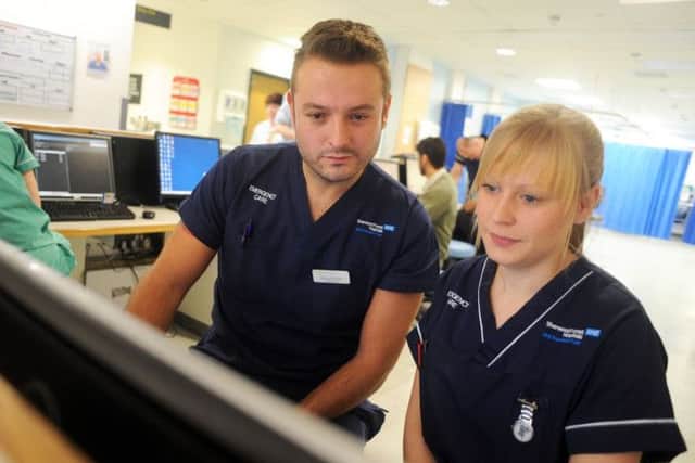 Department lead nurse, Richard Clarkson and staff nurse Steph Cordon on duty in the accident and emergency unit at Kings Mill Hospital.