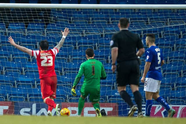 Chesterfield vs Leyton Orient - Dean Cox of Leyton Orient scores a late winner - Pic By James Williamson