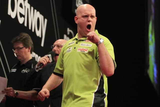 Michael van Gerwen beat Phil Taylor 7-3 to go top of the table