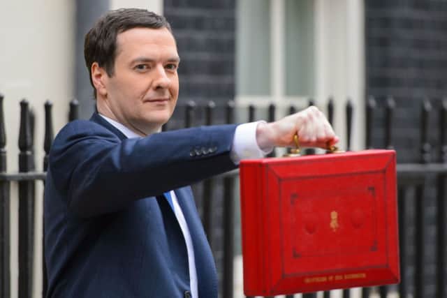 Chancellor of the Exchequer George Osborne outside 11 Downing Street before heading to the House of Commons to deliver his annual Budget statement. PRESS ASSOCIATION Photo. Picture date: Wednesday March 19, 2014. See PA BUDGET stories. Photo credit should read: Dominic Lipinski/PA Wire