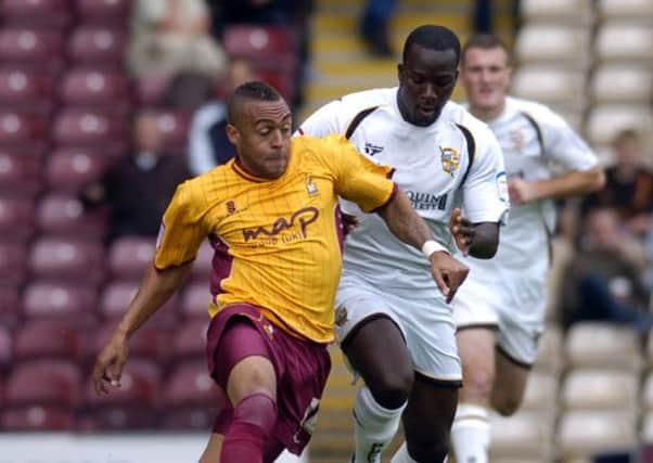 Date:4th September 2010.Bradford City v Port Vale, pictured Bradford's Jake Speight, keeps the ball away from Port Vale's Anthony Griffith.