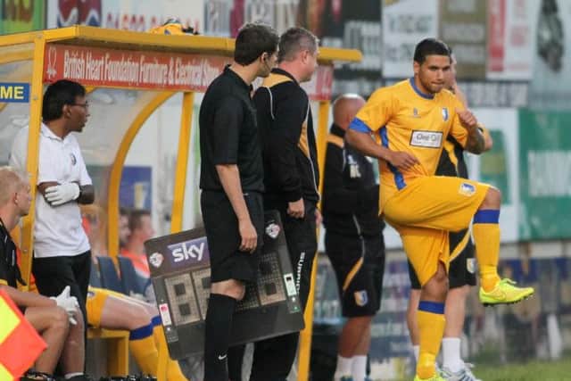 Liam Hearn prepares to enter the pitch as a second half substitute against Leeds United. Pic by: Richard Parkes