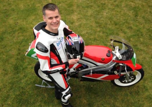 Motorcyclist Dave Binch is running around the 36 mile Isle of Man TT course in August to raise money for Cancer Research UK.