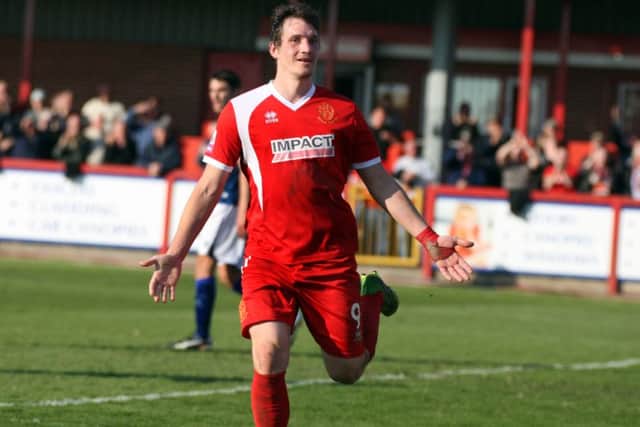 Paul Clayton starts to celebrate after scoring Alfretons third equaliser.