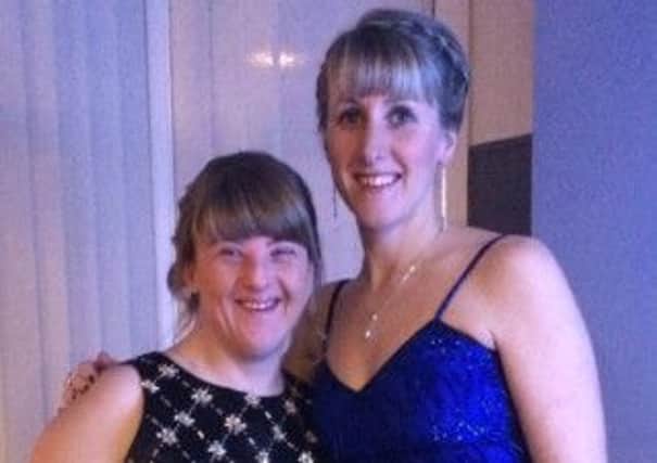 Sara Arnold (right)  and her sister Katie. Sara is running  the London Matathon in aid of the Downs Syndrome Association.
