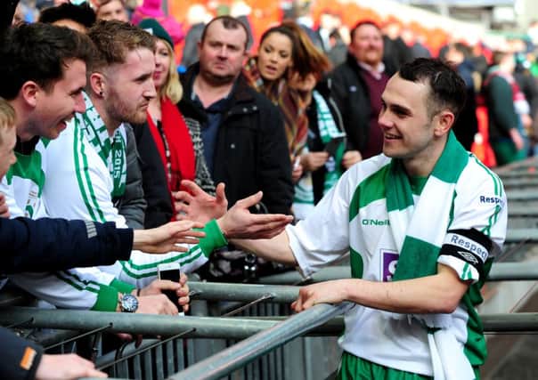 FA Trophy Final at Wembley Stadium.
North Ferriby United v Wrexham.
Ferriby's captain Liam King celebrates with the fans.
29th March 2015.
Picture Jonathan Gawthorpe.