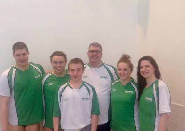 Coach Glenn Smith with his Nova Centurion swimmers at Glasgow.