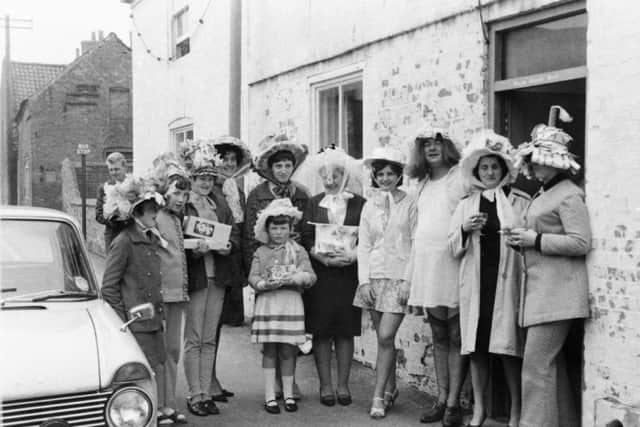 An Easter bonnet parade, in 1970 near the Plough Inn, Main Street, Farnsfield. Please picture credit North Notts Newspapers Ltd. Image courtesy of North Notts Newspapers Ltd, Nottinghamshire County Council archives and www.picturethepast.org.uk