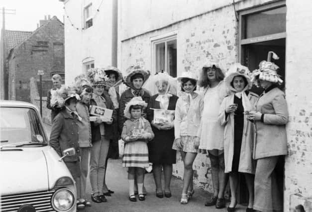 An Easter bonnet parade, in 1970 near the Plough Inn, Main Street, Farnsfield. Please picture credit North Notts Newspapers Ltd. Image courtesy of North Notts Newspapers Ltd, Nottinghamshire County Council archives and www.picturethepast.org.uk