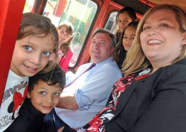 How many kids and Labour politicians can you get in a combined harvester, lots as it happens, when Ed Balls and Labour's Sherwood candidate, Lionie Mathers joins youngsters on one of the attractions at the White Post Farm centre on Tuesday.