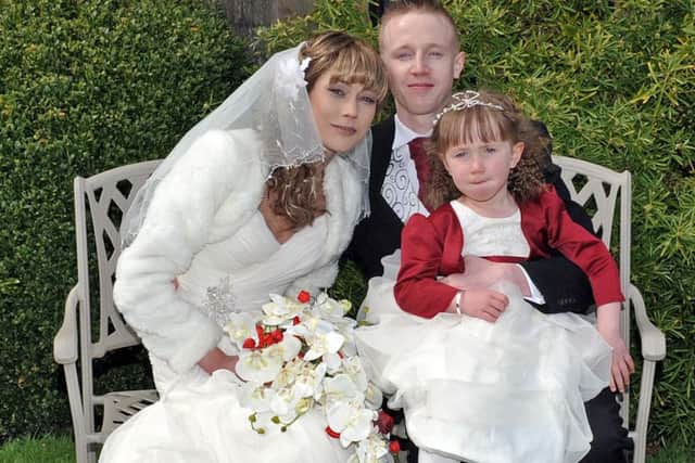 Wedding of  Leanna Cox and William Boulton at Newstead Abbey, pictured are the bride and groom with daughter Kelsa