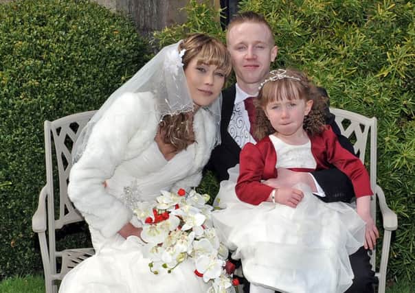 Wedding of  Leanna Cox and William Boulton at Newstead Abbey, pictured are the bride and groom with daughter Kelsa