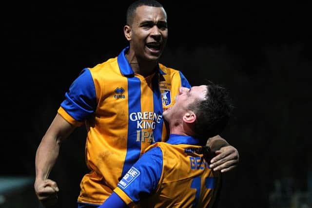Matt Green celebrates a goal for the Stags against Liverpool.