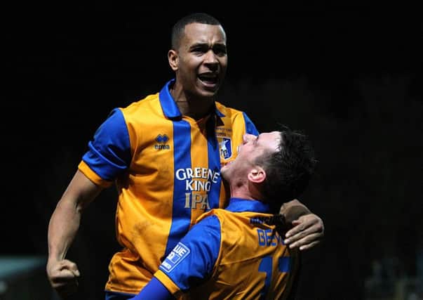 Matt Green celebrates a goal for the Stags against Liverpool.