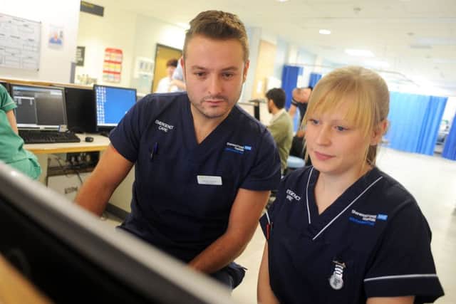 Department lead nurse, Richard Clarkson and staff nurse Steph Cordon on duty in the accident and emergency unit at Kings Mill Hospital.