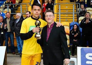 Jack Thomas receives the Chad Readers' Stags Player of the Year trophy from Chad Sports Editor John Lomas.