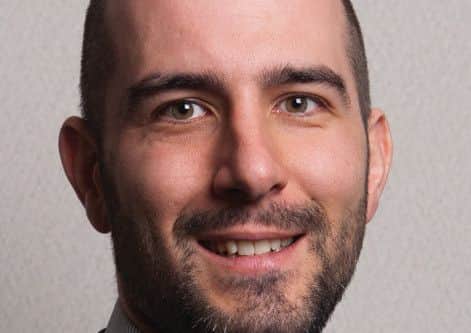 ASHFIELD'S NEW BOSS -- Robert Mitchell.