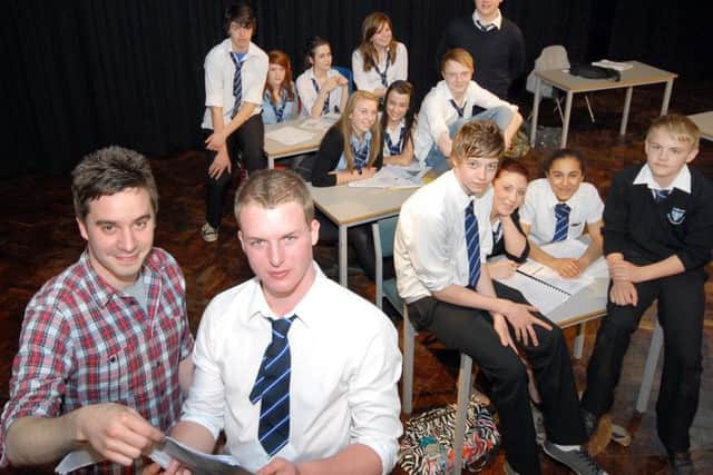 REMEMBERING HIS ROOTS -- James (left) on a visit to meet students at The Manor Academy in Mansfield Woodhouse to offer tips and advice.