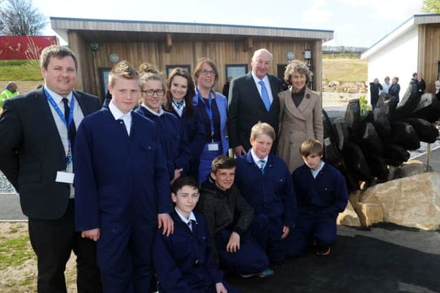 The Duke and Duchess of Devonshire, join Shirebrook head teacher, Julie Bloor for the official opening of the Pine Cone Centre at Shirebrook School on Tuesday.