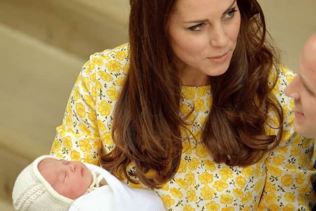 The Duchess of Cambridge outside the Lindo Wing of St Mary's Hospital in London, with her newborn daughter The Princess of Cambridge. PRESS ASSOCIATION Photo. Picture date: Saturday May 2, 2015. See PA story ROYAL Baby. Photo credit should read: John Stillwell/PA Wire