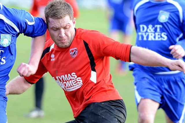 AFC Mansfield's Dean Rick (right) in action.