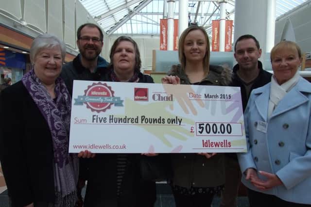 Ashfield's foodbank employees recieving their donations