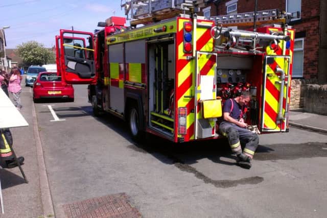 Firefighters at the scene following blaze at George Street, Mansfield.