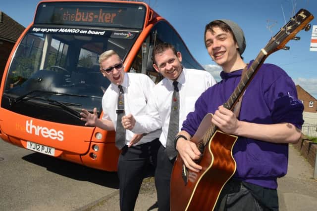 THE BUS BUSKER -- Warren Ireland with trentbarton drivers Lee Milne (left) and Allan Gilmour.