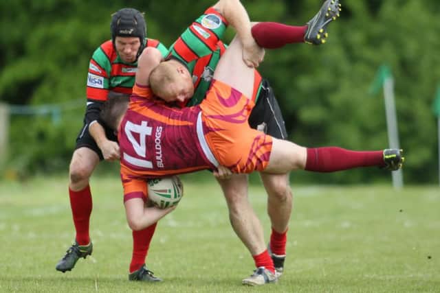 Brett Leivers thwarts a Bulldog surge forward - Pic by: Richard Parkes