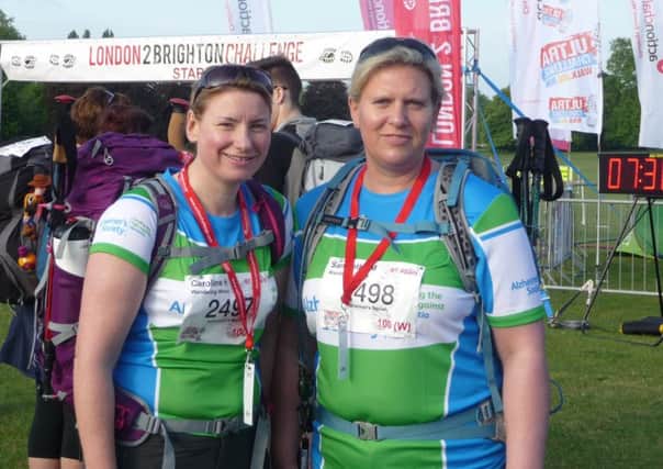Caroline Holland and Sam Martin take part in 100km walk