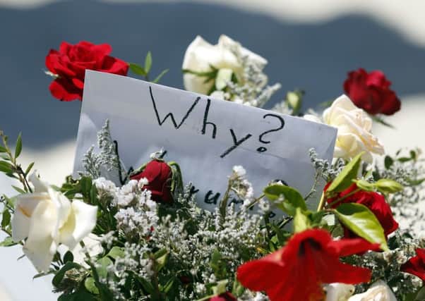 Flowers at the scene of the massacre in Sousse as sources warned the British death toll could rise (PA).